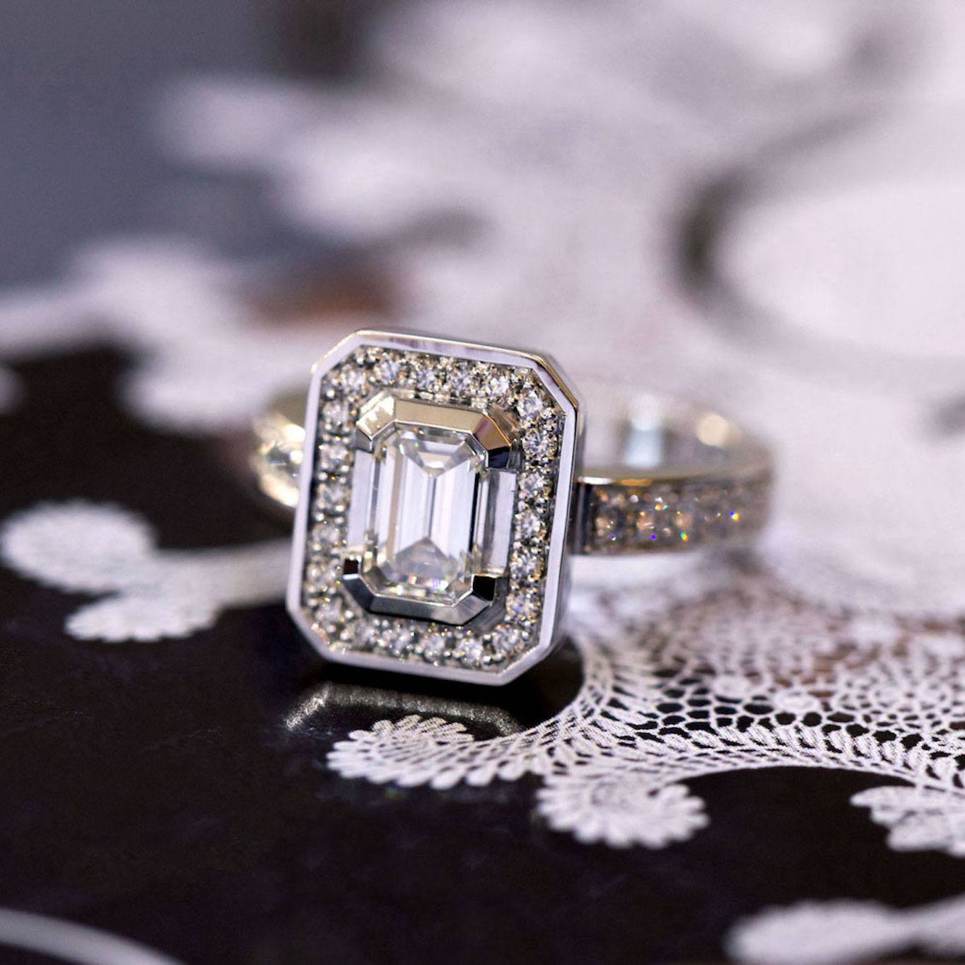 Emerald cut diamond halo ring